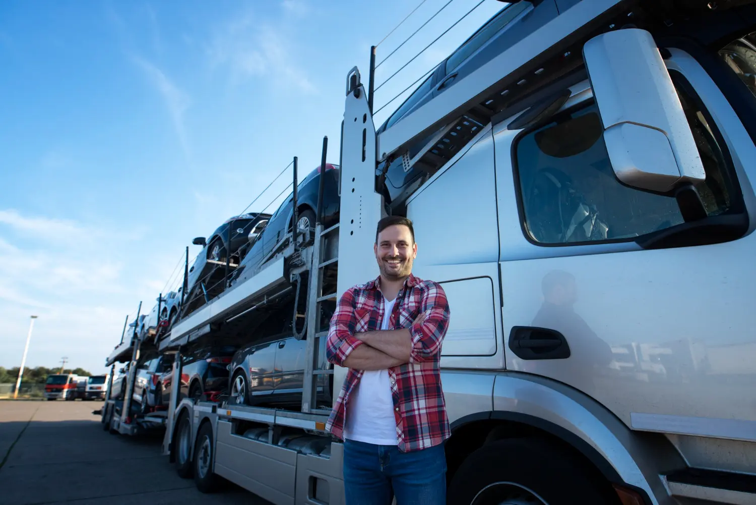 Haul truck operator standing beside heavy transport vehicle for Australian tax deductions and compliance guide