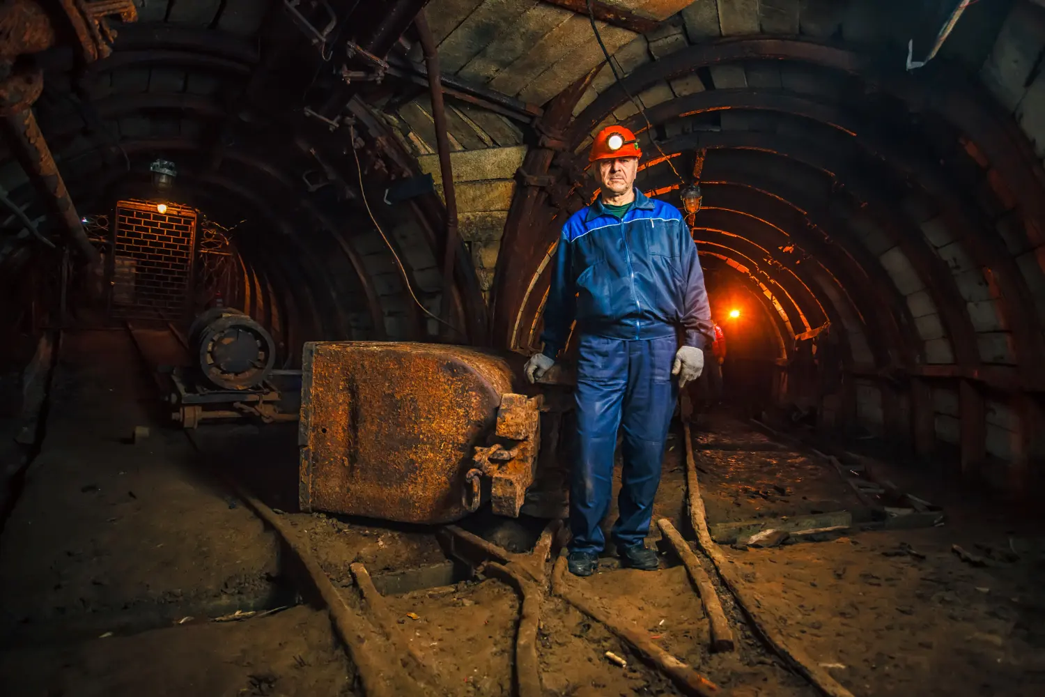 Mine rehabilitation technician working underground at mining site for Australian tax deductions and compliance guide