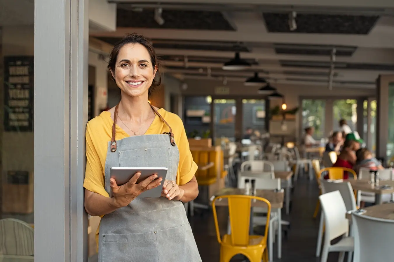 Smiling individual and sole trader receiving tax return and accounting services from expert accountants in Australia.